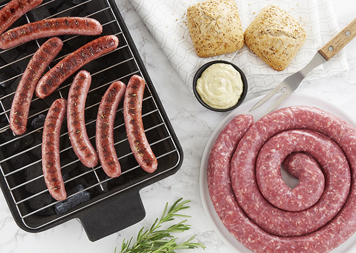 production of fresh sausages_sausages on barbecue and sausage roll