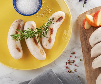fournisseurs de boudins blancs_boudin sur assiette et planche en bois fournisseurs de boudins blancs_boudin sur assiette et planche en bois